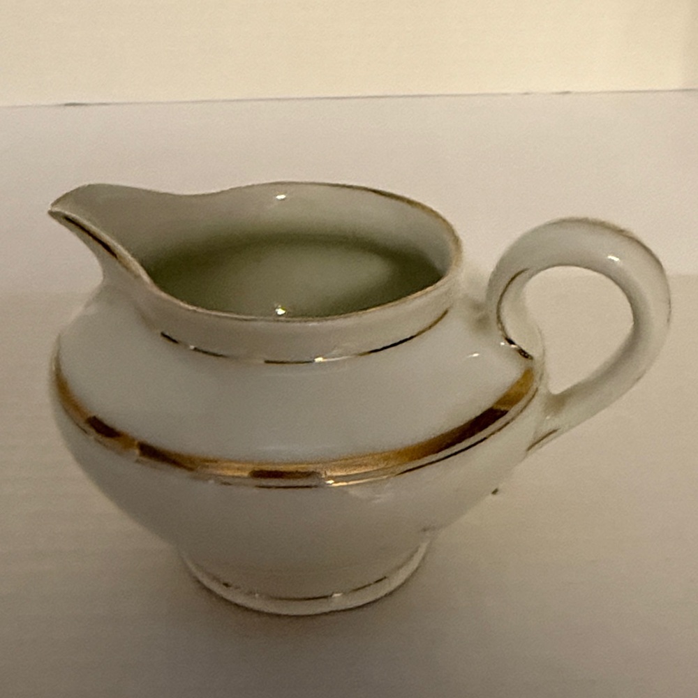 White Porcelain Creamer with Gold Trim